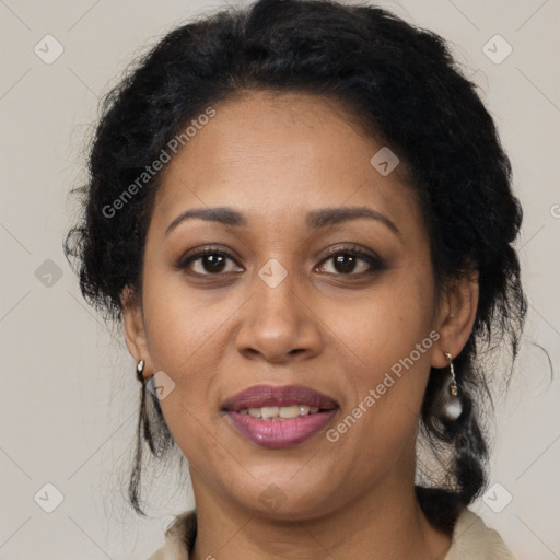 Joyful latino adult female with medium  brown hair and brown eyes