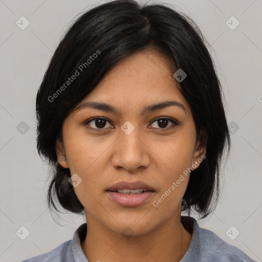 Joyful asian young-adult female with medium  black hair and brown eyes