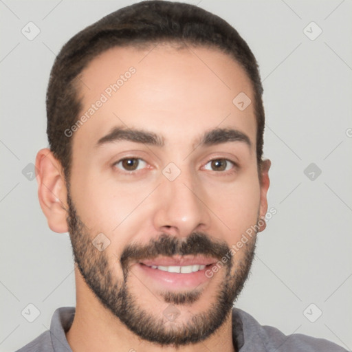 Joyful white young-adult male with short  black hair and brown eyes