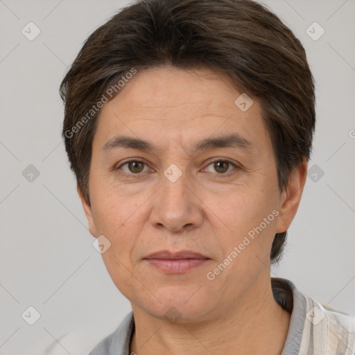 Joyful white adult female with short  brown hair and brown eyes