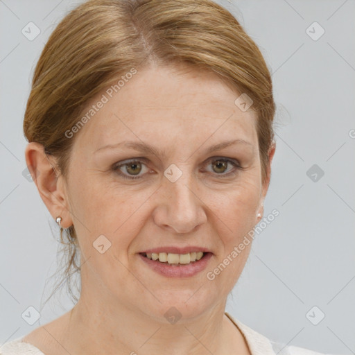 Joyful white adult female with short  brown hair and grey eyes