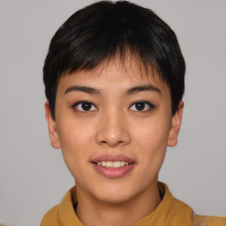 Joyful asian young-adult female with short  brown hair and brown eyes