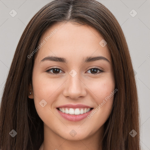 Joyful white young-adult female with long  brown hair and brown eyes