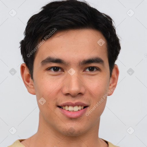 Joyful asian young-adult male with short  brown hair and brown eyes