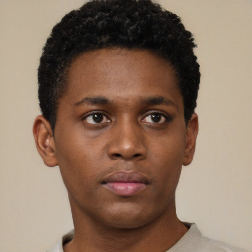 Neutral black young-adult male with short  brown hair and brown eyes