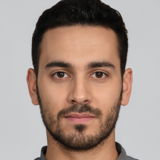 Neutral white young-adult male with short  black hair and brown eyes