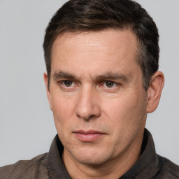 Neutral white adult male with short  brown hair and brown eyes