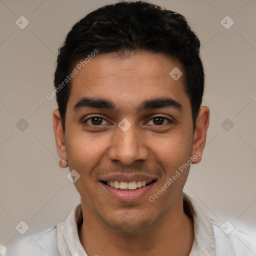 Joyful latino young-adult male with short  black hair and brown eyes