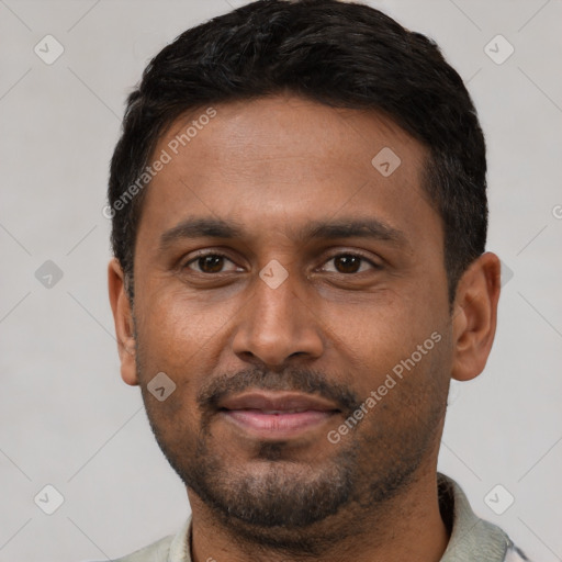 Joyful latino young-adult male with short  black hair and brown eyes
