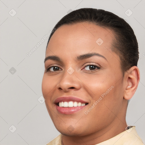 Joyful white young-adult female with short  brown hair and brown eyes