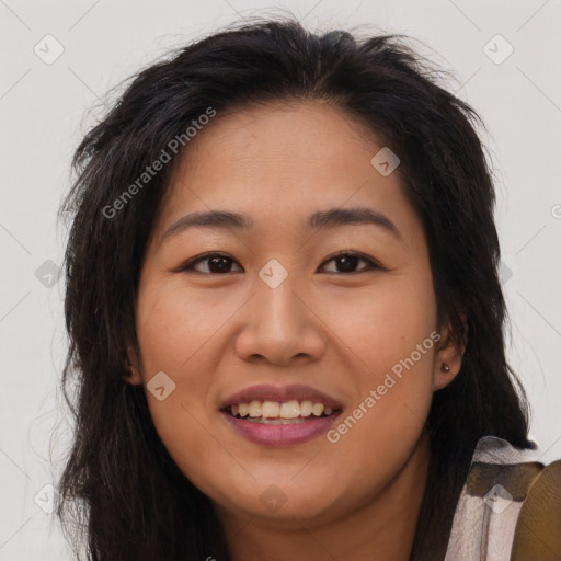 Joyful asian young-adult female with long  brown hair and brown eyes