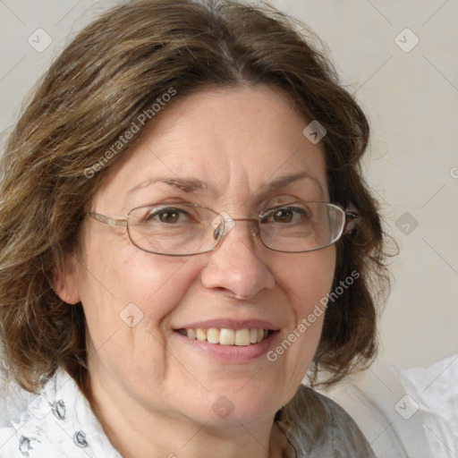 Joyful white middle-aged female with medium  brown hair and blue eyes