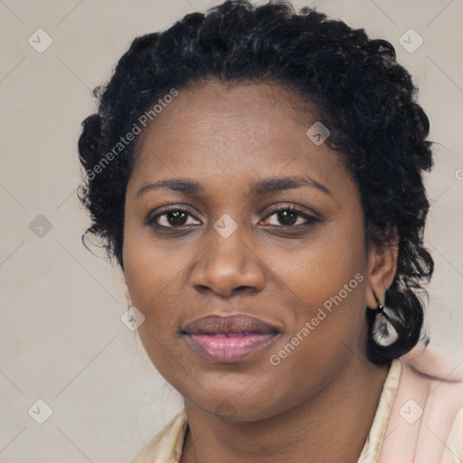 Joyful black young-adult female with medium  black hair and brown eyes