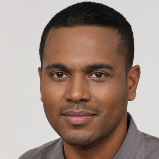 Neutral black young-adult male with short  black hair and brown eyes