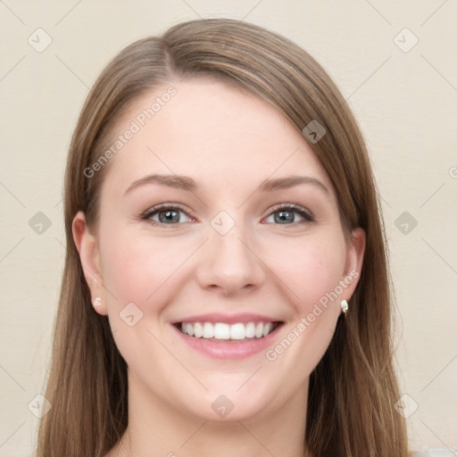 Joyful white young-adult female with long  brown hair and grey eyes