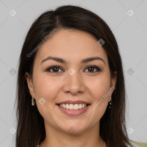 Joyful white young-adult female with long  brown hair and brown eyes