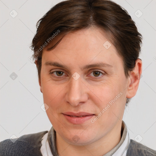 Joyful white adult female with medium  brown hair and brown eyes