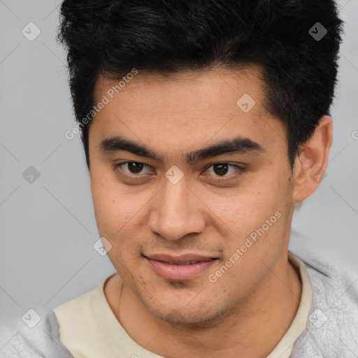 Joyful latino young-adult male with short  brown hair and brown eyes