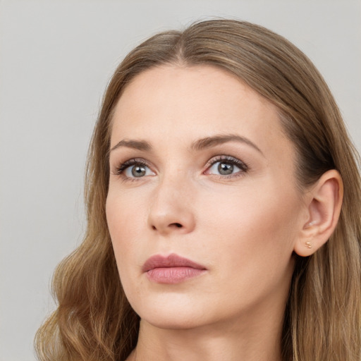 Neutral white young-adult female with long  brown hair and grey eyes