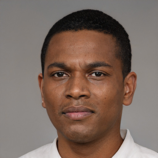 Neutral black young-adult male with short  black hair and brown eyes