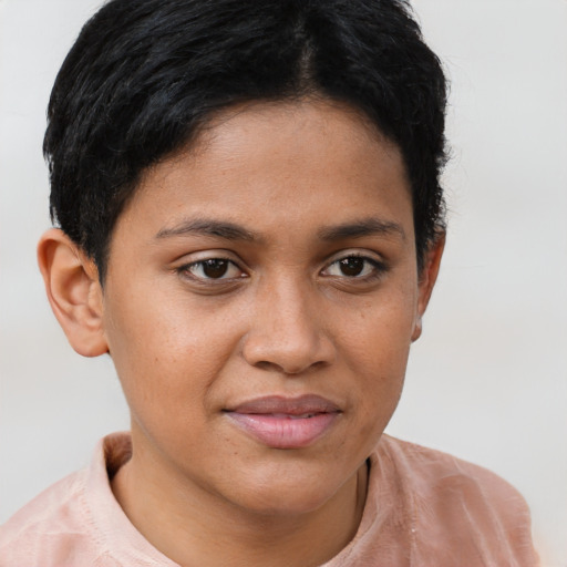 Joyful latino young-adult female with short  brown hair and brown eyes