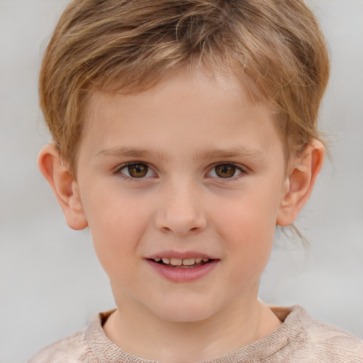 Joyful white child male with short  brown hair and grey eyes