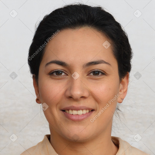 Joyful latino young-adult female with short  brown hair and brown eyes