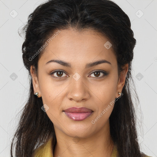 Joyful latino young-adult female with long  brown hair and brown eyes