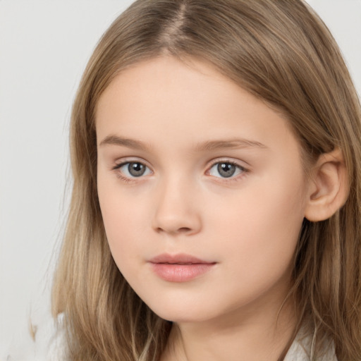 Neutral white child female with long  brown hair and brown eyes