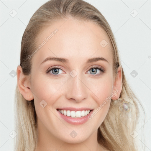 Joyful white young-adult female with long  brown hair and blue eyes