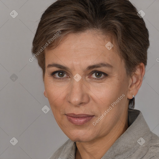 Joyful white adult female with short  brown hair and brown eyes