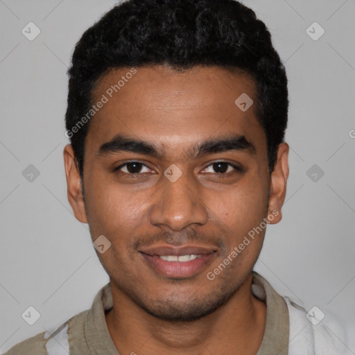 Joyful black young-adult male with short  black hair and brown eyes