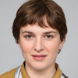 Joyful white young-adult female with medium  brown hair and grey eyes