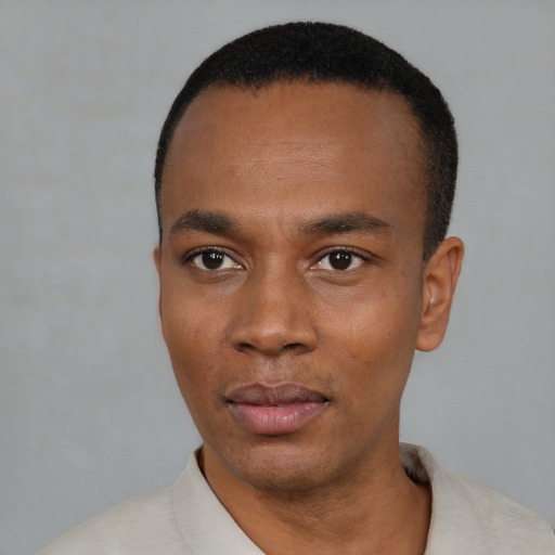 Neutral black young-adult male with short  black hair and brown eyes