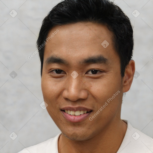 Joyful latino young-adult male with short  black hair and brown eyes