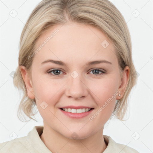 Joyful white young-adult female with medium  brown hair and blue eyes