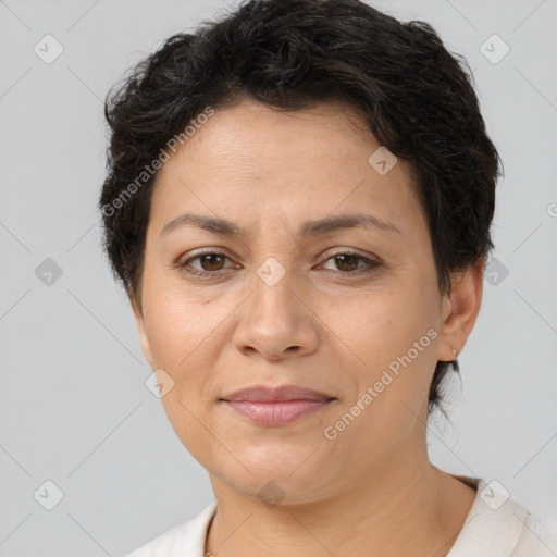 Joyful white adult female with short  brown hair and brown eyes