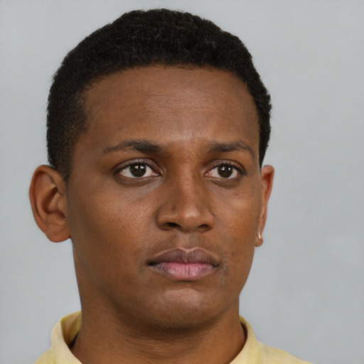 Neutral black young-adult male with short  brown hair and brown eyes