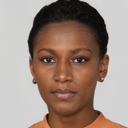 Neutral black young-adult female with short  black hair and brown eyes