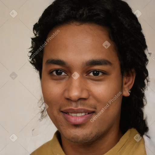 Joyful latino young-adult male with short  brown hair and brown eyes