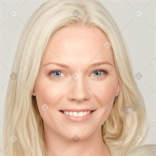 Joyful white young-adult female with long  blond hair and blue eyes