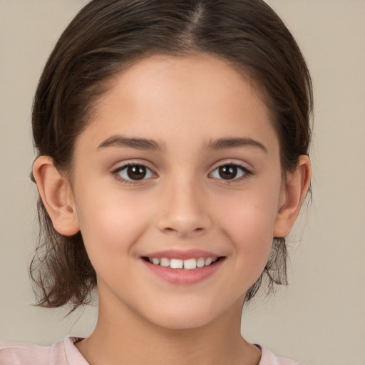 Joyful white child female with medium  brown hair and brown eyes