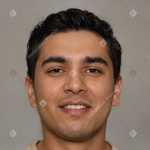 Joyful latino young-adult male with short  brown hair and brown eyes