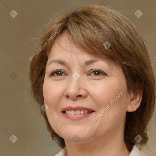 Joyful white adult female with medium  brown hair and brown eyes