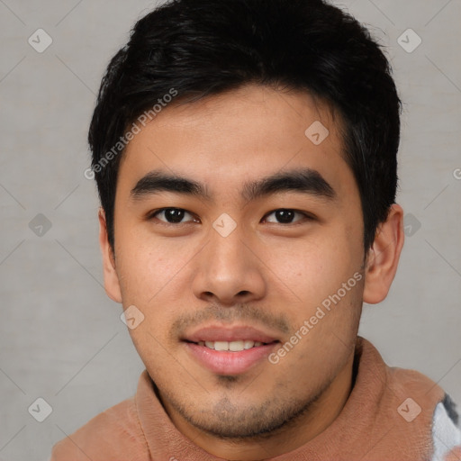 Joyful asian young-adult male with short  black hair and brown eyes