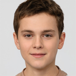 Joyful white child male with short  brown hair and brown eyes