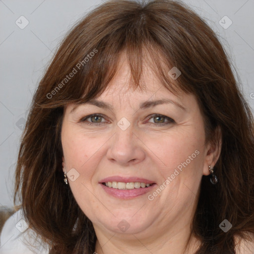 Joyful white adult female with medium  brown hair and brown eyes