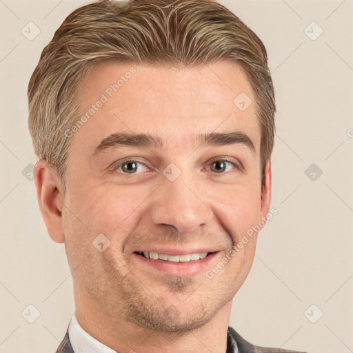 Joyful white adult male with short  brown hair and brown eyes