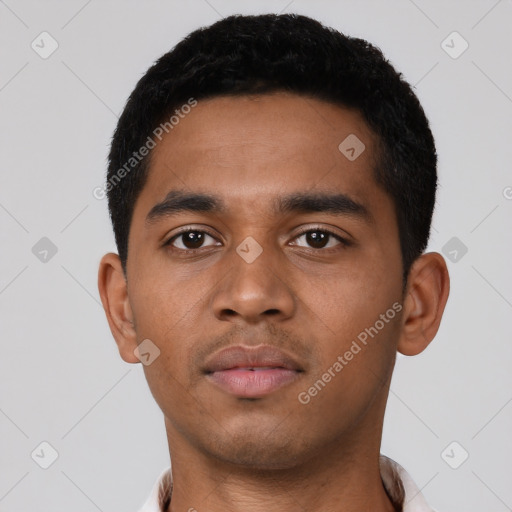 Neutral latino young-adult male with short  black hair and brown eyes