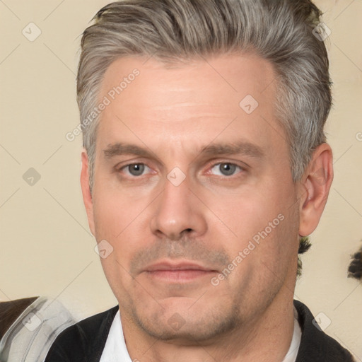 Neutral white adult male with short  brown hair and brown eyes